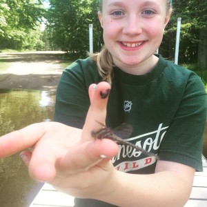 Trisha's daughter with dragonfly